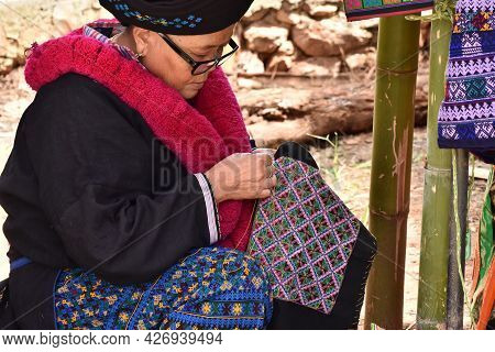 Unidentified Female Mien Hilltribe Embroider Pattern Colored Thread At Doi Mae Salong.