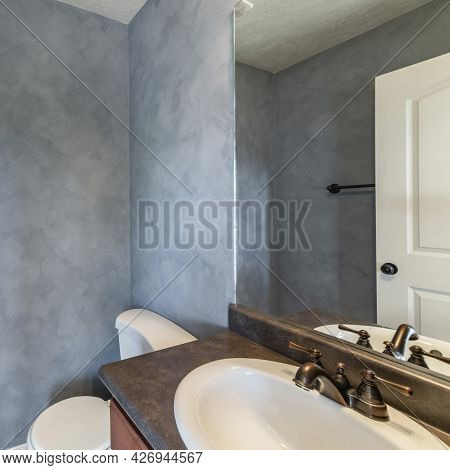 Square Frame Small Bathroom Interior With Faux Paint Concrete Wall
