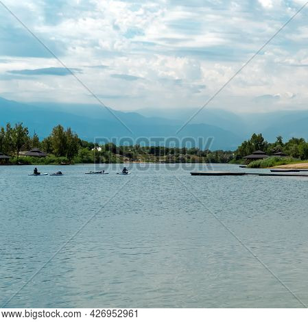 Sap Boards On The Lake In The Recreation Park On A Summer Day