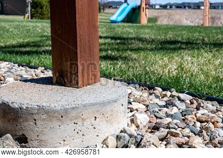 Wooden Deck Support Free-standing On A Concrete Tube Footing
