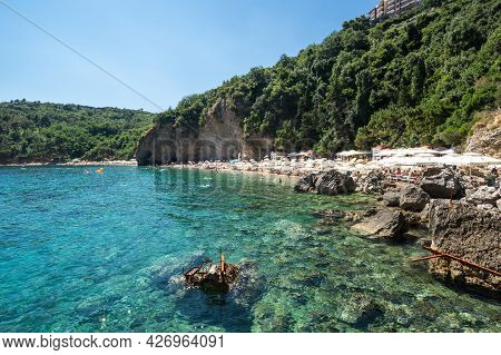 Budva, Montenegro - 28 June, 2019: View Of Mogren Beach, The Most Popular Beach Of Budva, Montenegro