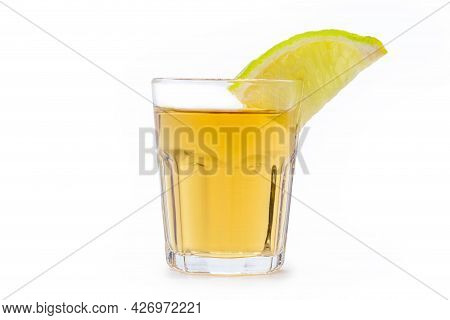 Glass Of Alcoholic Drink With Lemon, Distilled From Sugar Cane, Called In Brazil 