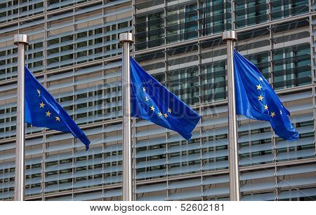 European Flags In Front Of The Berlaymont Building, Headquarters Of The European Commission In Bruss