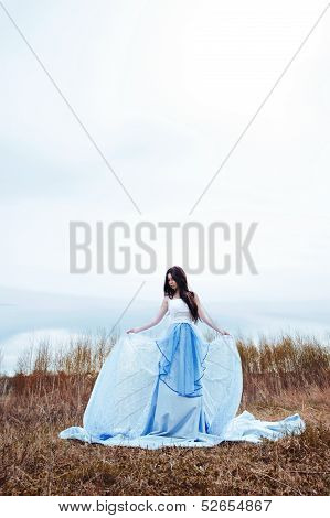 Girl in long blue dress