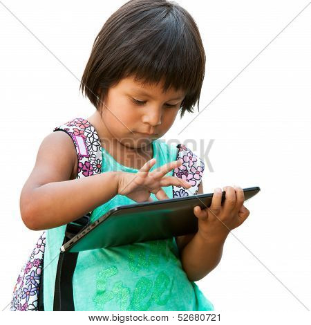 Cute Native American Girl Typing On Tablet.
