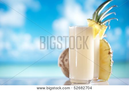 pinacolada pina colada cocktail on beach