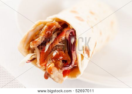 tortilla fajita wraps with meat and vegetables