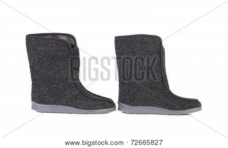 Pair of black felt boots.