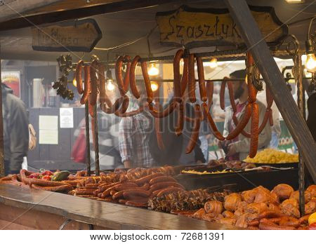 Smoked sausages and meat on a market