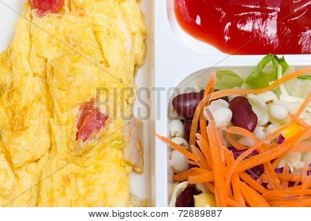 Omelette With Fresk Salad In White Plastic Box.