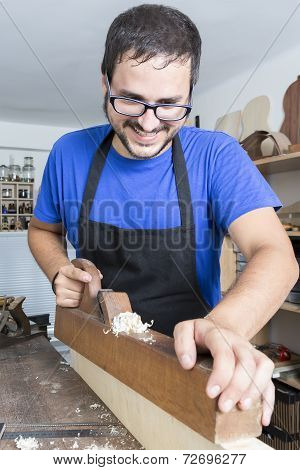 Luthier Working In His Workshop