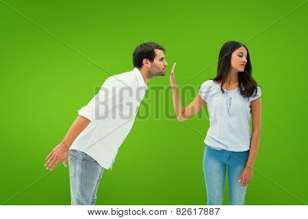 Brunette uninterested in mans advances against green vignette