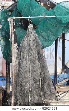 Large Fishing Nets In Fishing Boat At The Pier