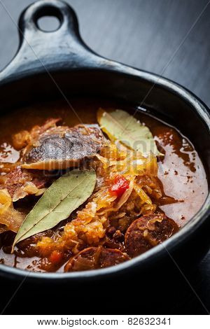Sauerkraut soup - cabbage soup with mushrooms and sujuk ( spicy sausage)