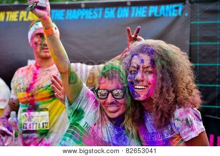 MAMAIA, CONSTANTA, ROMANIA - JULY 26: Mamaia color run 2014, in Mamaia, Constanta, on July 26, 2014. People from all walks of life participating in the fun summer run