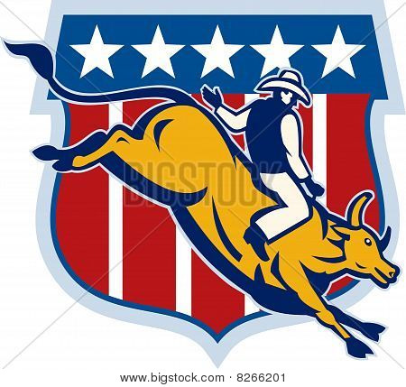 Rodeo cowboy bull riding with american shield