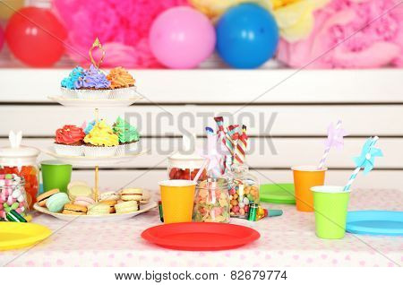 Prepared birthday table with sweets for children party