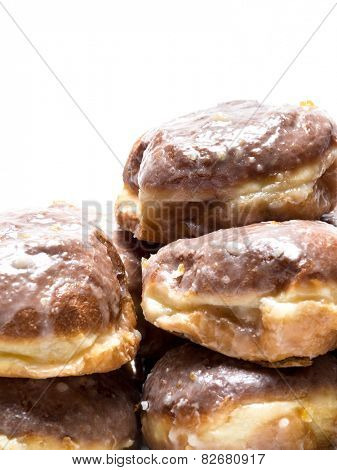 Pile of Polish donuts on white  background
