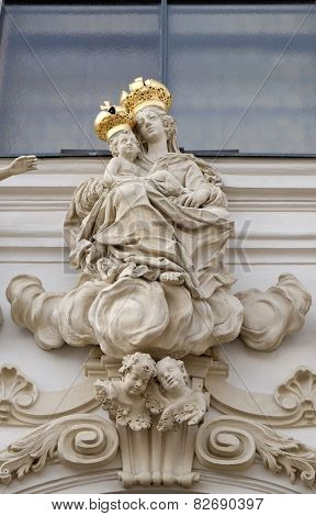 GRAZ, AUSTRIA - JANUARY 10, 2015: Virgin Mary with baby Jesus on the portal of Mariahilf church in Graz, Styria, Austria on January 10, 2015.