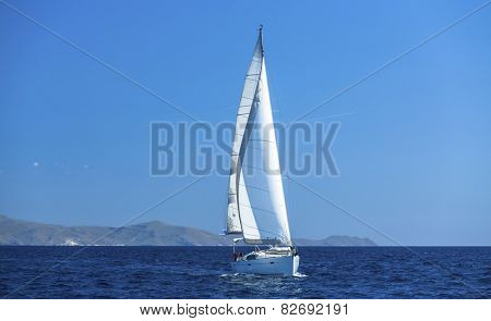 Sailing ship yachts with white sails. Luxery sailing yacht.