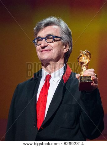 BERLIN, GERMANY - FEBRUARY 12: Wim Wenders receives the Honorary Golden Bear for his lifetime achievement. 65th Berlin Film Festival at Berlinale Palace on February 12, 2015 in Berlin, Germany