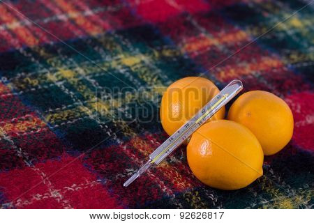 Lemons And Thermometer