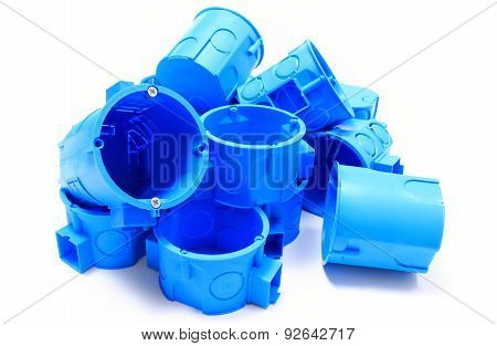 Heap Of Blue Electrical Boxes On White Background