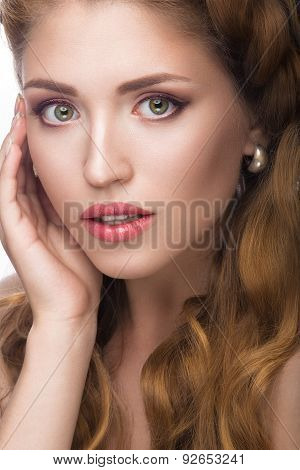 Beautiful girl with a light Nude make-up and blond hair. Beauty face.