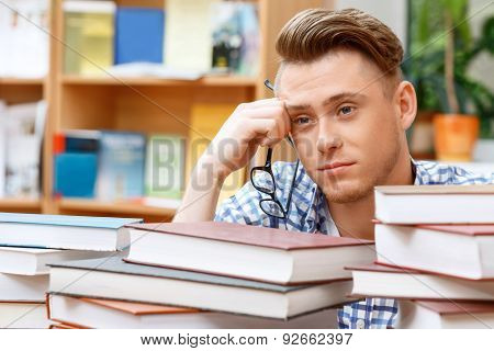 Young student working in a library
