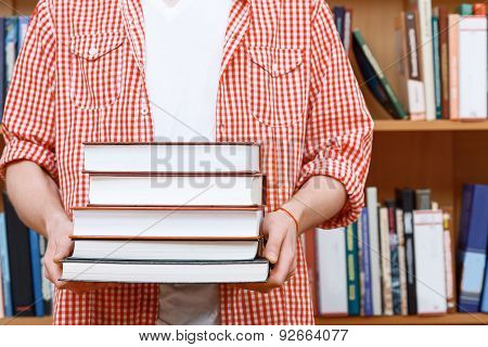 Man hands in a library