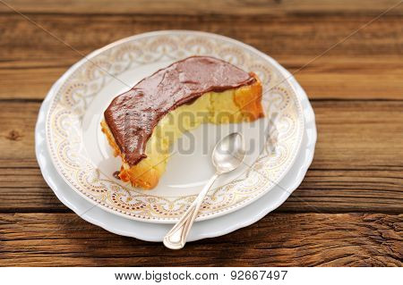Homemade Oldfashioned Pie With Chololate Icing And Tea Spoon On White Plates