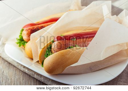 Hotdogs On Wooden Table