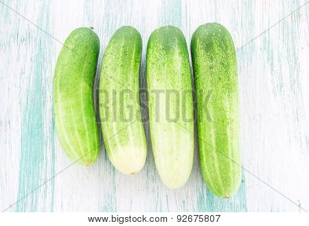 Cucumbers On The Wooden Background