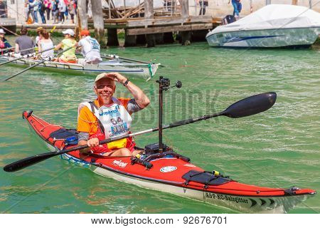 Oarsmen in the Venice Vogalonga regatta, Italy.