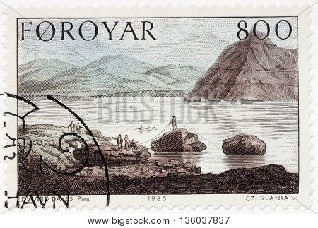 LUGA RUSSIA - JUNE 25 2016: A stamp printed by FAROE ISLANDS shows Faroese landscape. Engraving after drawing by painting of famous English watercolour artist Edward Dayes circa 1985.