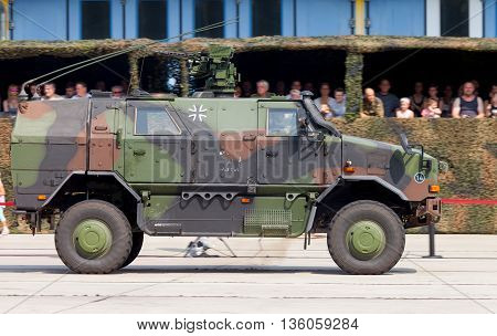 BURG / GERMANY - JUNE 25 2016: german armored military infantry mobility vehicle ATF Dingo drives on open day in barrack burg / germany at june 25 2016