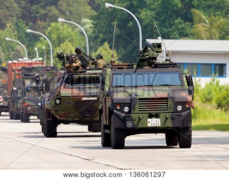 BURG / GERMANY - JUNE 25 2016: german military army convoy drives on open day in barrack burg / germany at june 25 2016