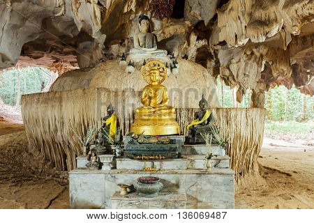 Image of Buddha in the cave. Tiger Cave Temple Krabi Thailand.
