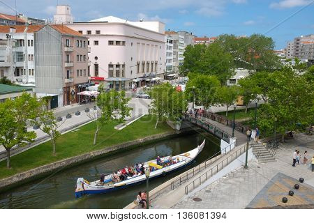 Aveiro, Portugal - 17 June 2016. Typical Moliceiro boat in the canals of the city of Aveiro in Portugal