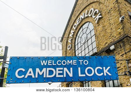 London United Kingdom - April 30 2016: Camden market - a very popular among tourists and locals place in London with stalls shops pubs and restaurants. Camden Lock sign