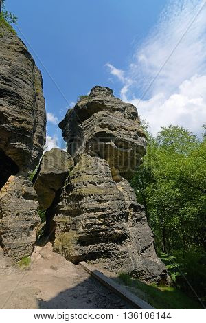 Tisa rocks with green forest in hot summer