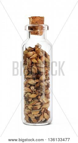 Dried utsho suneli in glass bottle on white background