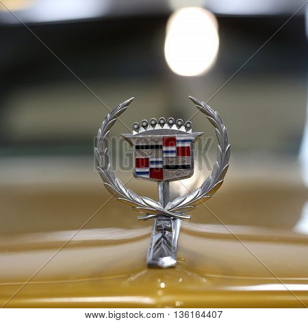 CRACOW POLAND - MAY 21 2016: Cadillac metallic logo closeup on Cadillac car displayed at 3rd edition of MOTO SHOW in Cracow Poland. Exhibitors present most interesting aspects of the automotive industry