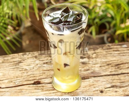 Soy milk grass Jelly on old wooden