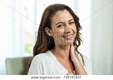 Portrait of businesswoman sitting in office
