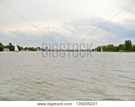 Hamburg Germany - May 24 2008: Hamburg Aussenalster river with view of the skyline of Hamburg city