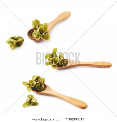 Wooden spoon full of sacchettoni stuffed pasta isolated over the white background, set of three different foreshortenings