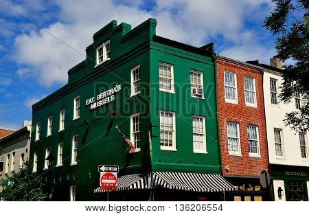 Baltimore Maryland - July 22 2013: 18th and 19th century buildings now house shops pubs and restaurants in the historic Fells Point neighbourhood