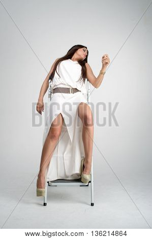 sensual lovely girl posing to camera in studio