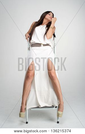 sensual lovely girl posing to camera in studio